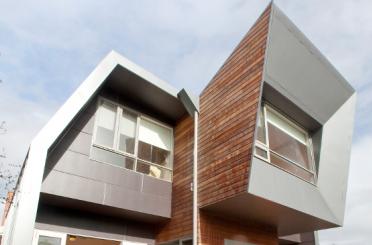 a house with a triangular shaped roof