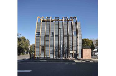 a building with a curved roof