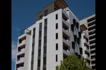 a white building with black windows