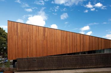 a building with a wooden wall
