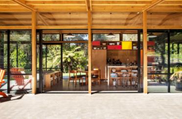 a room with a dining table and chairs