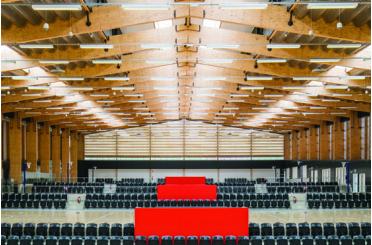 a large room with rows of chairs