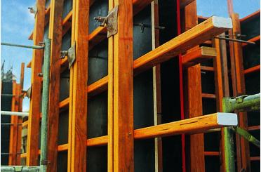 a wooden structure with metal rods